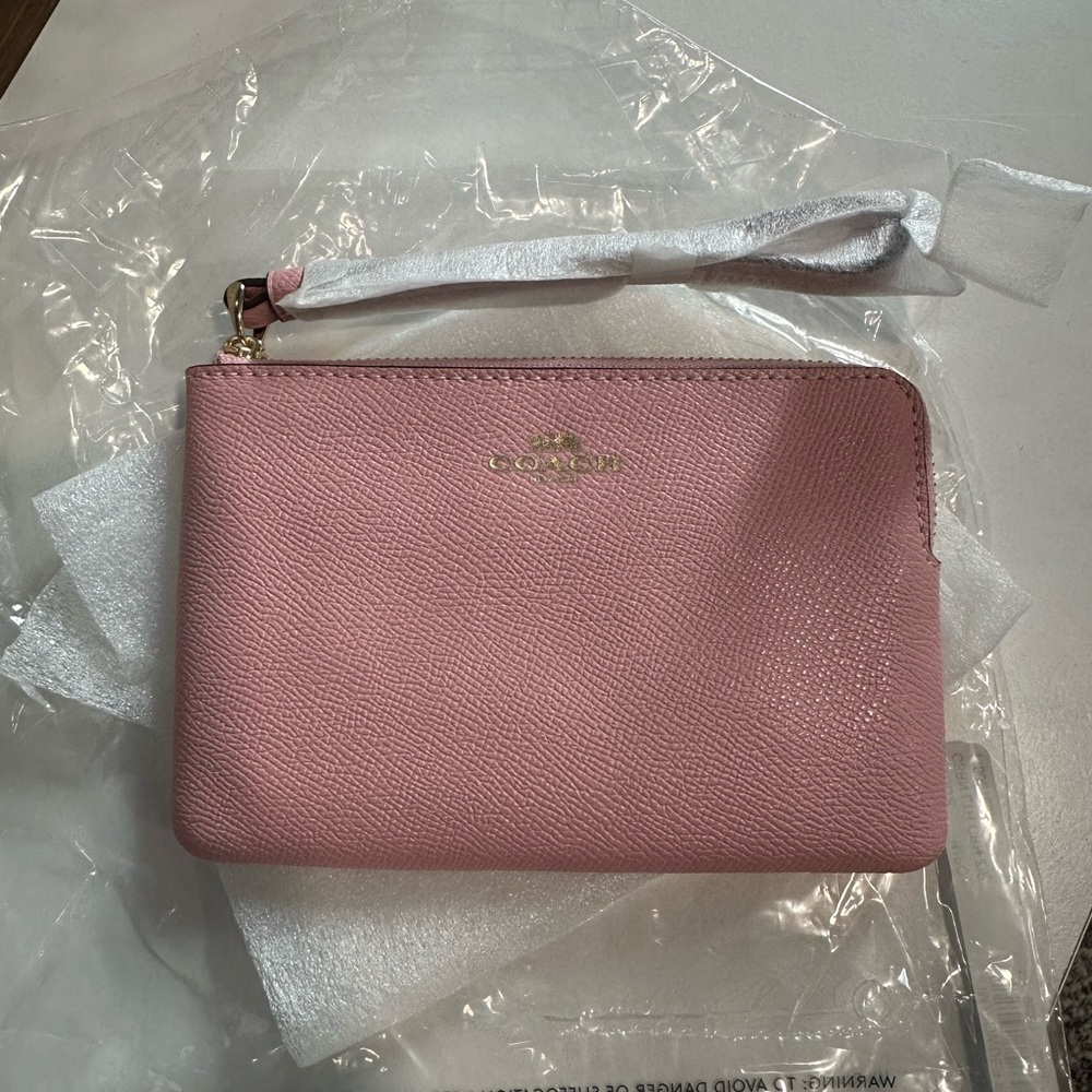 Coach Blush Pink Wristlet with Silver Accents
